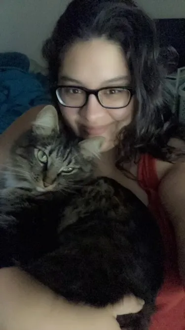 Oliver Mittens held close in a selfie with his family